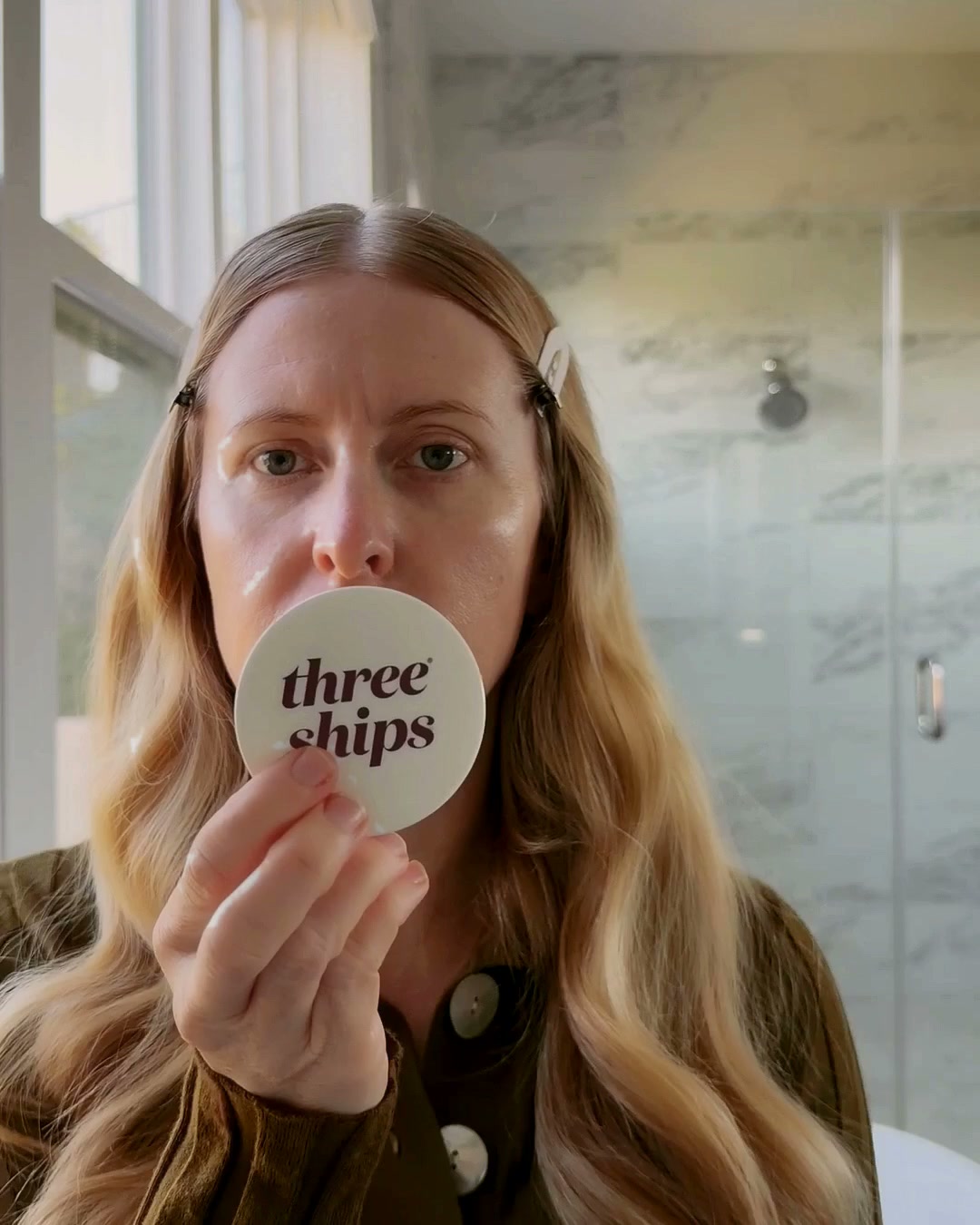 Laura holding a Three Ships jar